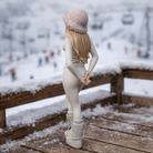 Chic Après-Ski Minimalist in Faux-Fur Bucket Hat | Resin Figurine