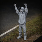 Excitable Young Racing Fan | Grey Resin Diorama Figurine