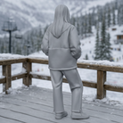 Chic Après-Ski Tourist in Sherpa Fleece & Trousers | Resin Figurine